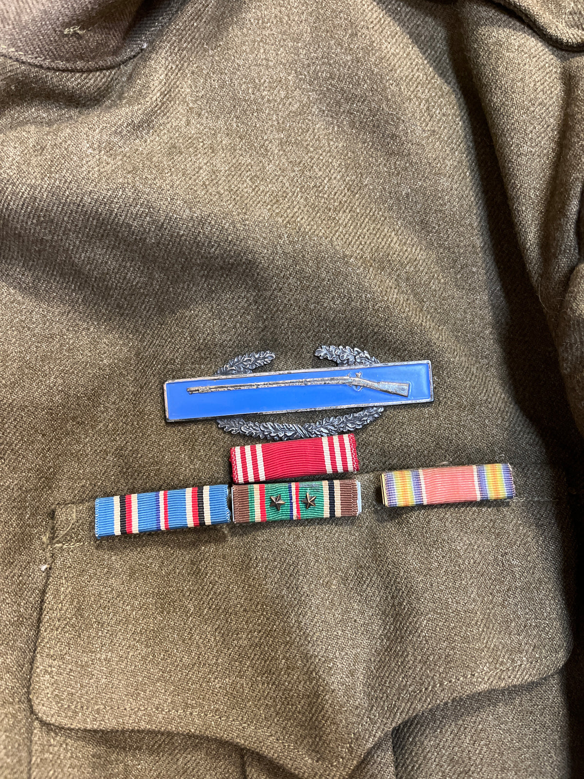 Vintage WWII M-1944 Wool "Ike" Jacket with insignia